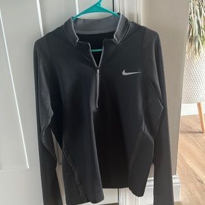 Nike Men’s Golf 1/2 zip in a Men’s size Small. 100% authentic and premium fabric